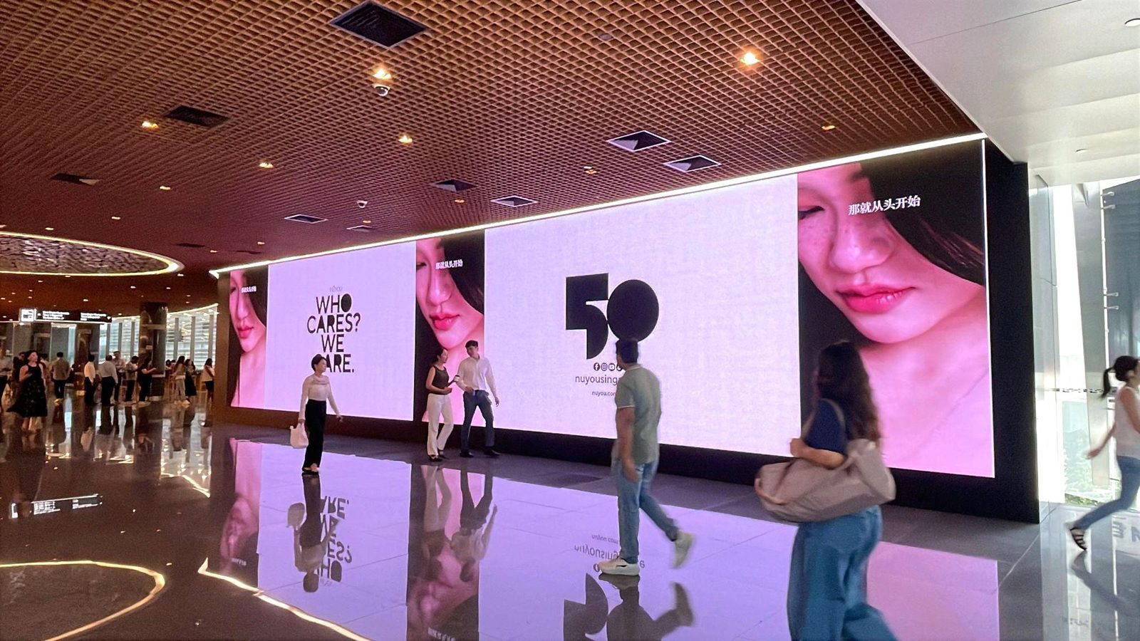 Asia Square Tower 1 LED screen advertising in Marina Bay, Singapore